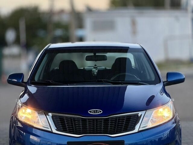 Синий Киа Рио, объемом двигателя 1.4 л и пробегом 138 тыс. км за 8399 $, фото 1 на Automoto.ua