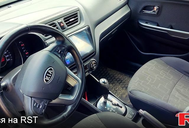 Синій Кіа Ріо, об'ємом двигуна 1.6 л та пробігом 158 тис. км за 8700 $, фото 4 на Automoto.ua