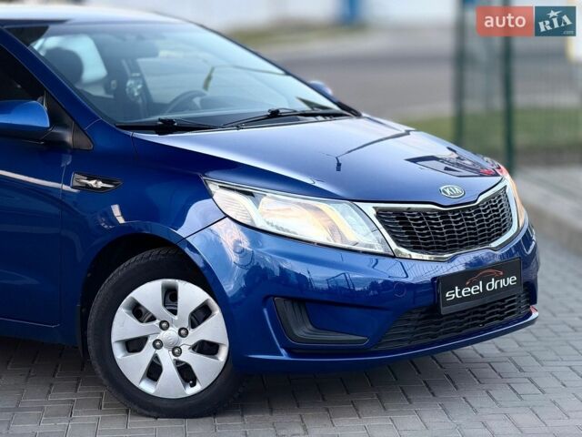 Синий Киа Рио, объемом двигателя 1.4 л и пробегом 138 тыс. км за 8399 $, фото 3 на Automoto.ua
