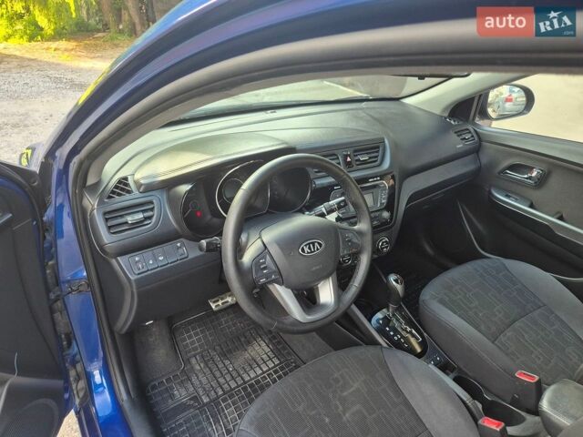 Синій Кіа Ріо, об'ємом двигуна 1.6 л та пробігом 150 тис. км за 8350 $, фото 9 на Automoto.ua
