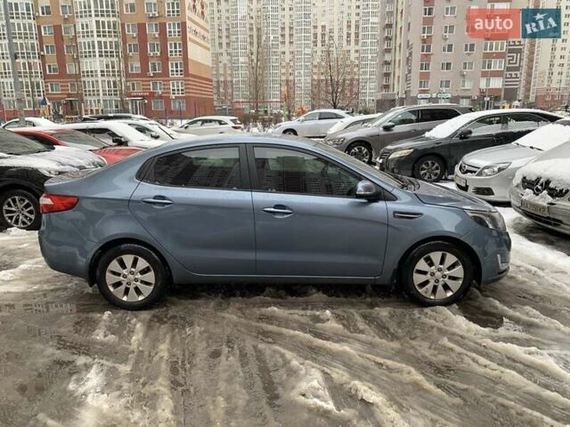 Синий Киа Рио, объемом двигателя 1.59 л и пробегом 182 тыс. км за 7000 $, фото 2 на Automoto.ua