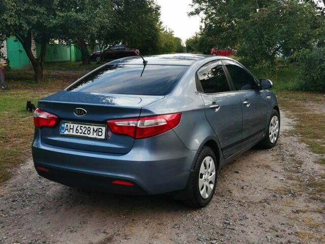 Синій Кіа Ріо, об'ємом двигуна 1.4 л та пробігом 138 тис. км за 8300 $, фото 4 на Automoto.ua