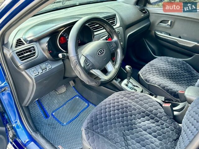 Синій Кіа Ріо, об'ємом двигуна 1.6 л та пробігом 190 тис. км за 5999 $, фото 14 на Automoto.ua