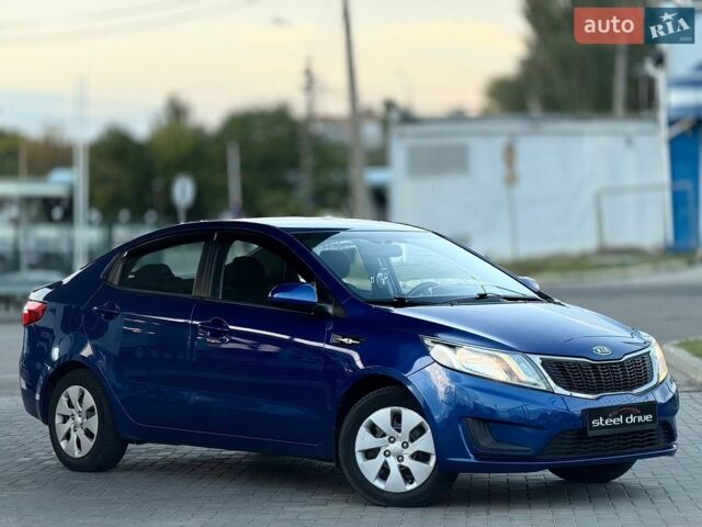 Синий Киа Рио, объемом двигателя 1.4 л и пробегом 138 тыс. км за 8399 $, фото 2 на Automoto.ua