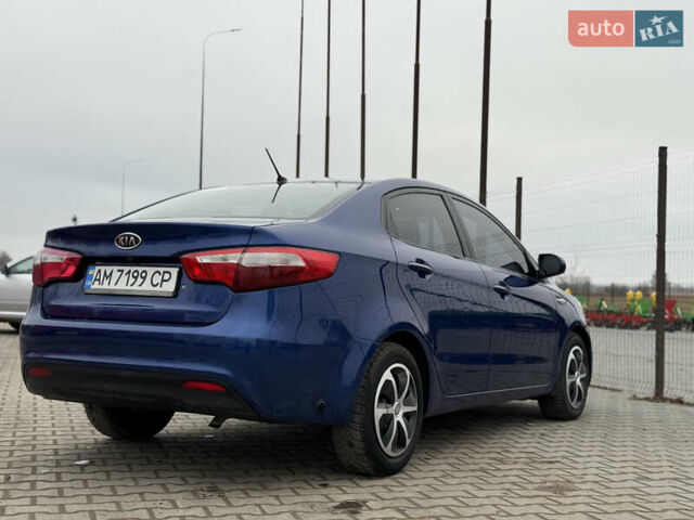 Синій Кіа Ріо, об'ємом двигуна 1.4 л та пробігом 187 тис. км за 6750 $, фото 13 на Automoto.ua