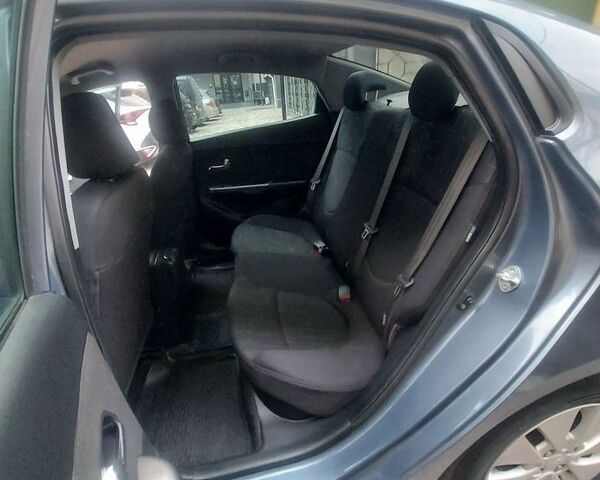 Синій Кіа Ріо, об'ємом двигуна 1.6 л та пробігом 182 тис. км за 7900 $, фото 13 на Automoto.ua