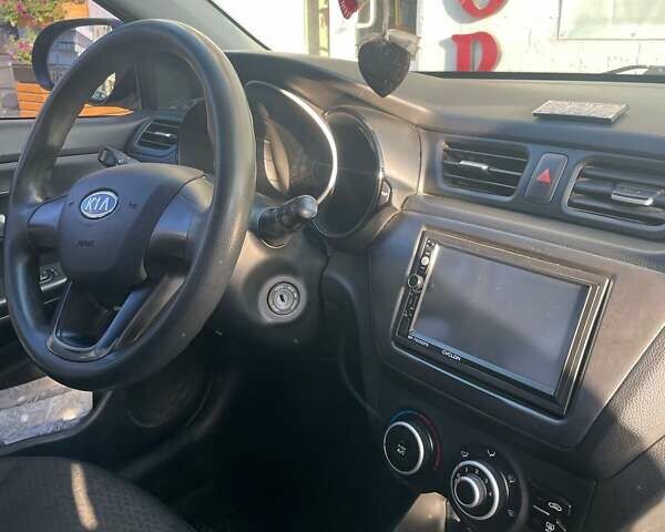 Синій Кіа Ріо, об'ємом двигуна 1.4 л та пробігом 183 тис. км за 7300 $, фото 6 на Automoto.ua