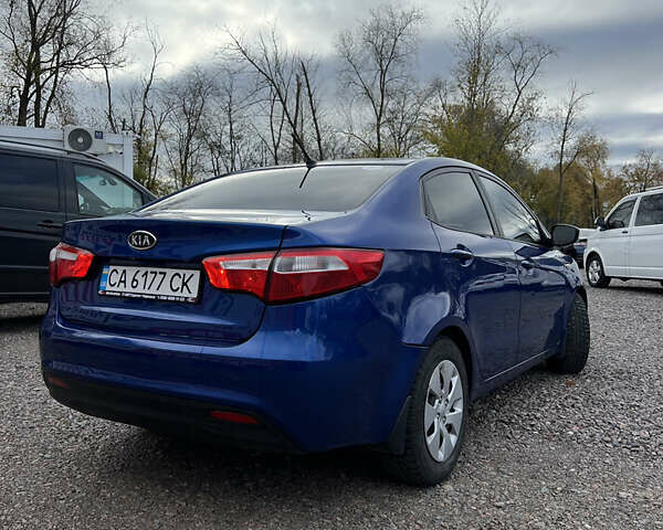 Синій Кіа Ріо, об'ємом двигуна 1.59 л та пробігом 128 тис. км за 7900 $, фото 5 на Automoto.ua