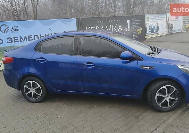 Синій Кіа Ріо, об'ємом двигуна 1.4 л та пробігом 187 тис. км за 6700 $, фото 9 на Automoto.ua