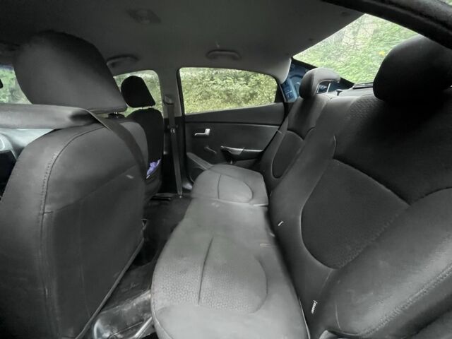 Синий Киа Рио, объемом двигателя 1.6 л и пробегом 130 тыс. км за 5294 $, фото 12 на Automoto.ua