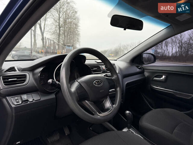 Синій Кіа Ріо, об'ємом двигуна 1.4 л та пробігом 187 тис. км за 6750 $, фото 17 на Automoto.ua