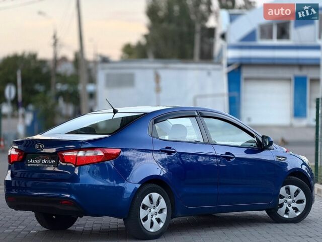 Синий Киа Рио, объемом двигателя 1.4 л и пробегом 138 тыс. км за 8399 $, фото 4 на Automoto.ua