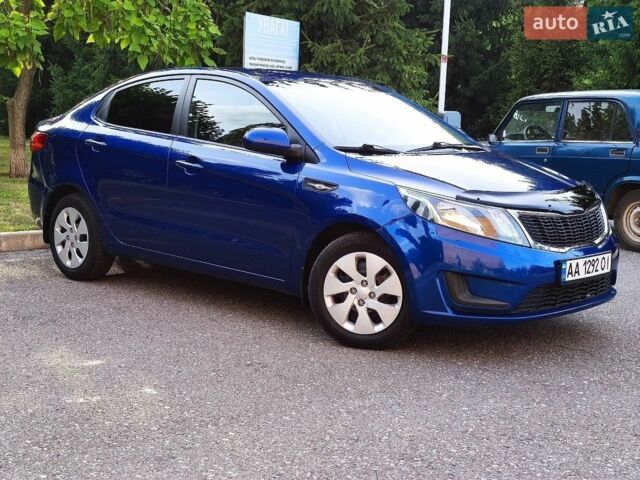 Синий Киа Рио, объемом двигателя 1.4 л и пробегом 129 тыс. км за 7600 $, фото 1 на Automoto.ua