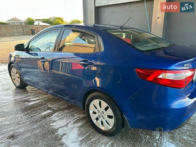 Синий Киа Рио, объемом двигателя 1.6 л и пробегом 248 тыс. км за 7500 $, фото 2 на Automoto.ua
