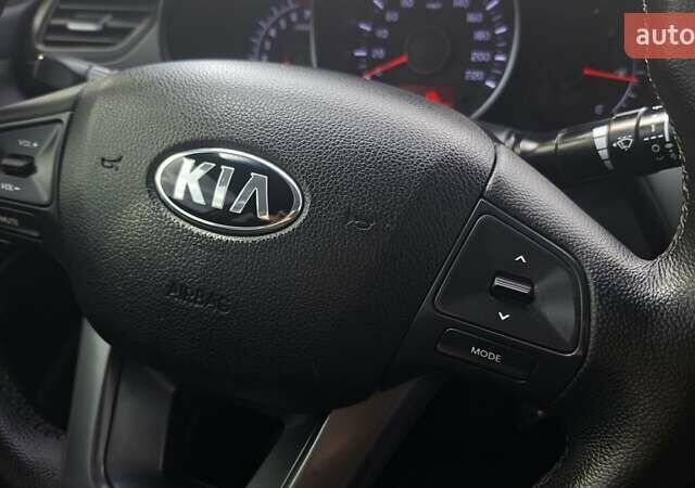 Синий Киа Рио, объемом двигателя 1.4 л и пробегом 164 тыс. км за 6600 $, фото 2 на Automoto.ua