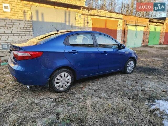 Синій Кіа Ріо, об'ємом двигуна 1.4 л та пробігом 190 тис. км за 7500 $, фото 3 на Automoto.ua