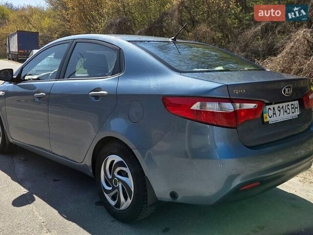 Синий Киа Рио, объемом двигателя 1.4 л и пробегом 292 тыс. км за 6700 $, фото 5 на Automoto.ua