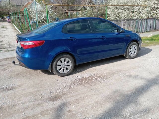 Синий Киа Рио, объемом двигателя 1.6 л и пробегом 240 тыс. км за 5818 $, фото 1 на Automoto.ua