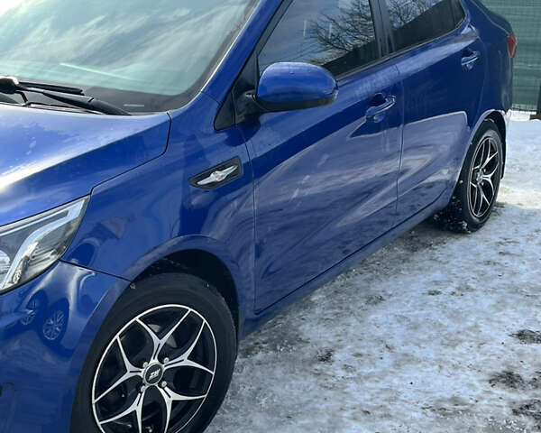 Синий Киа Рио, объемом двигателя 1.4 л и пробегом 139 тыс. км за 7700 $, фото 2 на Automoto.ua