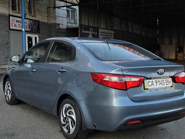 Синій Кіа Ріо, об'ємом двигуна 1.4 л та пробігом 296 тис. км за 6311 $, фото 4 на Automoto.ua