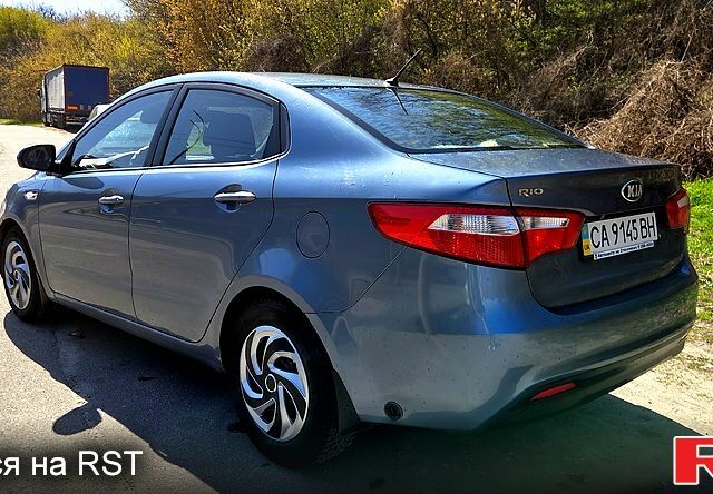 Синій Кіа Ріо, об'ємом двигуна 1.4 л та пробігом 292 тис. км за 6500 $, фото 5 на Automoto.ua