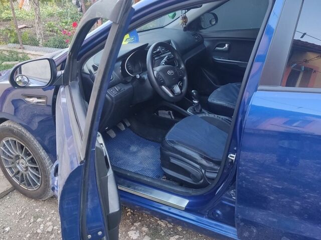 Синій Кіа Ріо, об'ємом двигуна 1.4 л та пробігом 178 тис. км за 7300 $, фото 26 на Automoto.ua