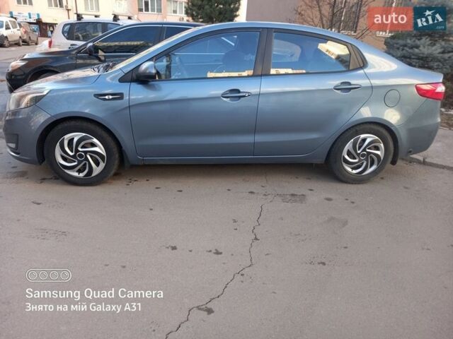 Синий Киа Рио, объемом двигателя 1.4 л и пробегом 283 тыс. км за 6600 $, фото 1 на Automoto.ua