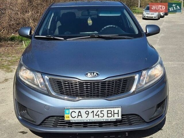 Синий Киа Рио, объемом двигателя 1.4 л и пробегом 292 тыс. км за 6700 $, фото 1 на Automoto.ua