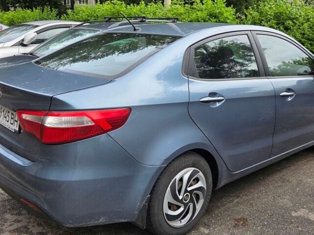 Синій Кіа Ріо, об'ємом двигуна 1.4 л та пробігом 292 тис. км за 6400 $, фото 5 на Automoto.ua