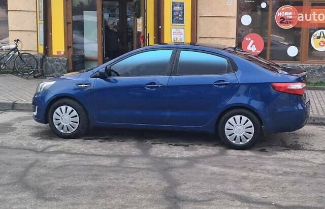Синий Киа Рио, объемом двигателя 1.4 л и пробегом 213 тыс. км за 7400 $, фото 2 на Automoto.ua