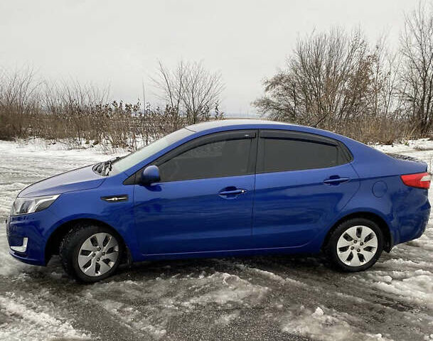 Синий Киа Рио, объемом двигателя 1.4 л и пробегом 150 тыс. км за 8500 $, фото 5 на Automoto.ua