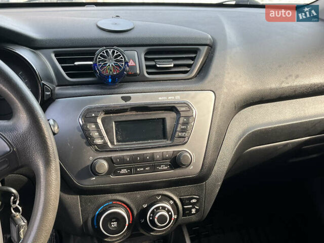 Синий Киа Рио, объемом двигателя 1.4 л и пробегом 139 тыс. км за 7700 $, фото 4 на Automoto.ua