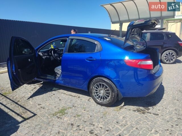 Синій Кіа Ріо, об'ємом двигуна 1.4 л та пробігом 178 тис. км за 7300 $, фото 9 на Automoto.ua