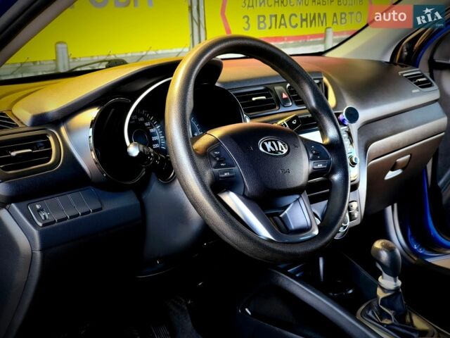 Синий Киа Рио, объемом двигателя 1.4 л и пробегом 129 тыс. км за 7600 $, фото 9 на Automoto.ua