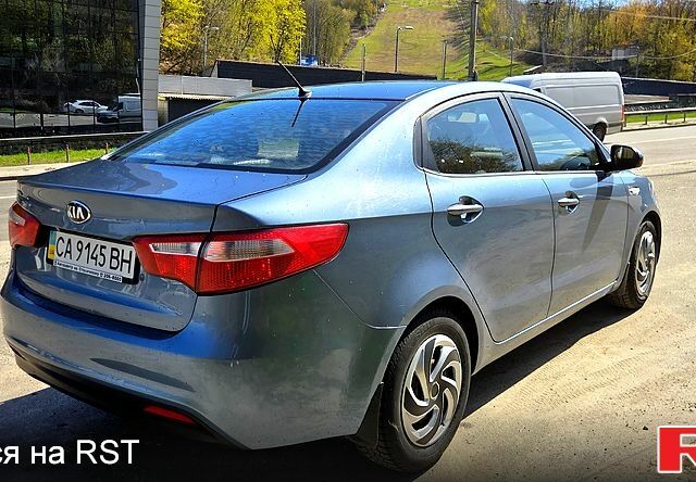 Синій Кіа Ріо, об'ємом двигуна 1.4 л та пробігом 292 тис. км за 6500 $, фото 4 на Automoto.ua