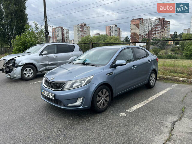 Синий Киа Рио, объемом двигателя 1.59 л и пробегом 143 тыс. км за 14000 $, фото 2 на Automoto.ua