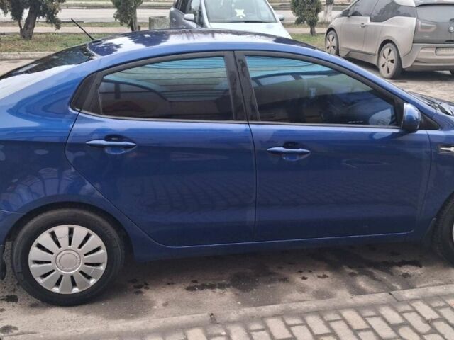 Синий Киа Рио, объемом двигателя 1.4 л и пробегом 213 тыс. км за 7400 $, фото 6 на Automoto.ua