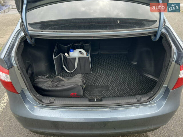 Синий Киа Рио, объемом двигателя 1.59 л и пробегом 143 тыс. км за 14000 $, фото 12 на Automoto.ua