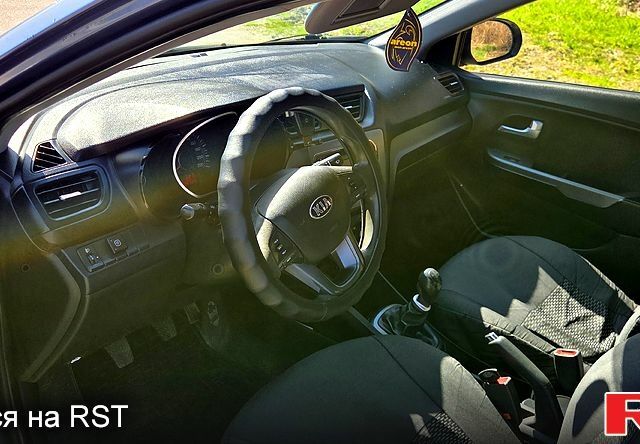 Синій Кіа Ріо, об'ємом двигуна 1.4 л та пробігом 292 тис. км за 6500 $, фото 8 на Automoto.ua