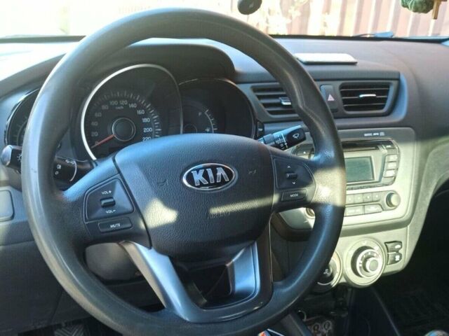 Синій Кіа Ріо, об'ємом двигуна 1.4 л та пробігом 175 тис. км за 7600 $, фото 7 на Automoto.ua