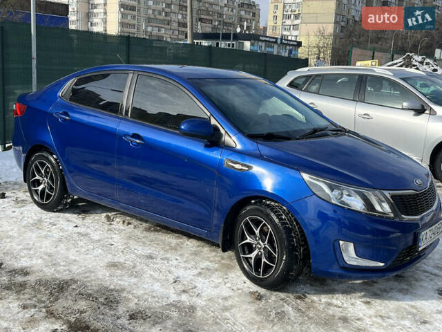 Синий Киа Рио, объемом двигателя 1.4 л и пробегом 139 тыс. км за 7700 $, фото 1 на Automoto.ua