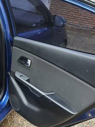 Синій Кіа Ріо, об'ємом двигуна 1.6 л та пробігом 222 тис. км за 5500 $, фото 8 на Automoto.ua