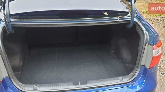 Синій Кіа Ріо, об'ємом двигуна 1.6 л та пробігом 222 тис. км за 5500 $, фото 3 на Automoto.ua