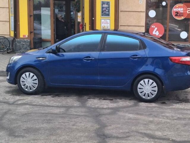 Синий Киа Рио, объемом двигателя 1.4 л и пробегом 213 тыс. км за 7400 $, фото 2 на Automoto.ua