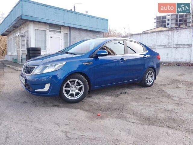 Синий Киа Рио, объемом двигателя 1.59 л и пробегом 121 тыс. км за 7599 $, фото 1 на Automoto.ua