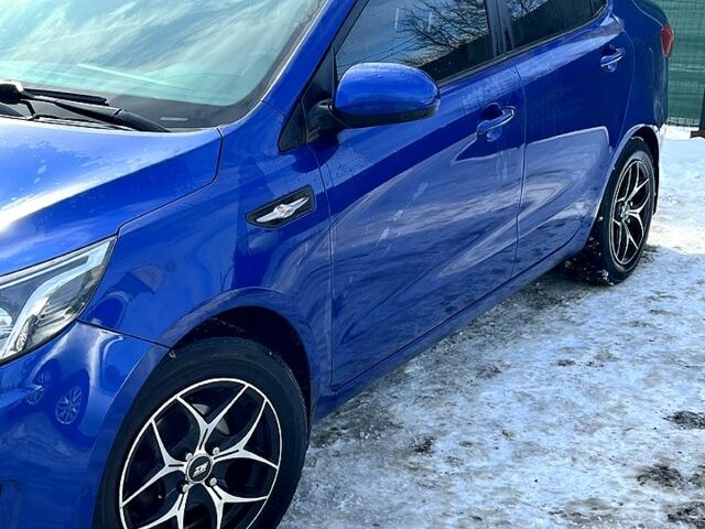 Синий Киа Рио, объемом двигателя 1.4 л и пробегом 13800 тыс. км за 8000 $, фото 1 на Automoto.ua