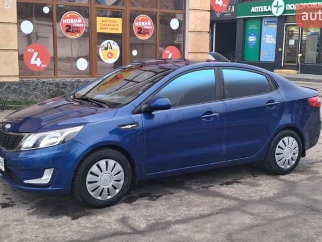 Синий Киа Рио, объемом двигателя 1.4 л и пробегом 213 тыс. км за 7400 $, фото 1 на Automoto.ua