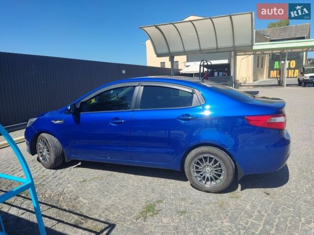Синій Кіа Ріо, об'ємом двигуна 1.4 л та пробігом 178 тис. км за 7300 $, фото 3 на Automoto.ua