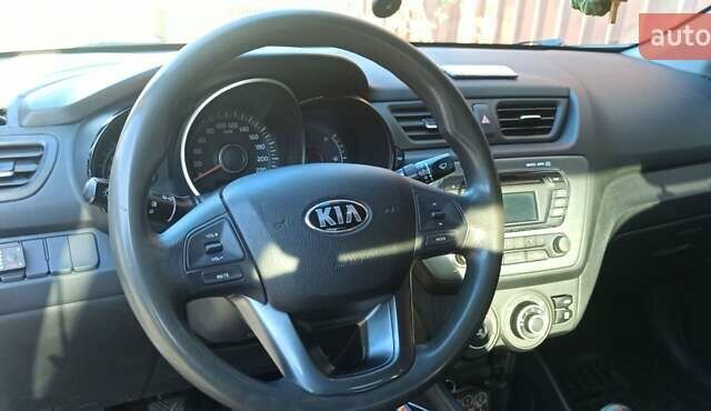 Синій Кіа Ріо, об'ємом двигуна 1.4 л та пробігом 175 тис. км за 7600 $, фото 7 на Automoto.ua