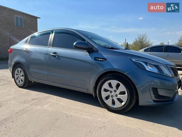 Синий Киа Рио, объемом двигателя 1.4 л и пробегом 120 тыс. км за 7499 $, фото 4 на Automoto.ua